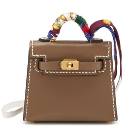 Hermès Etoupe Tadelakt Micro Mini Kelly Twilly Bag Charm Gold Hardware, 2022