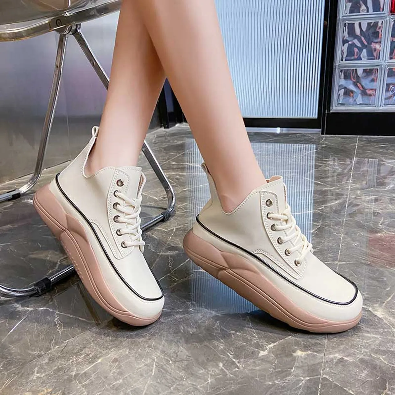 White stitch accents rocker bottom shoe sneaker