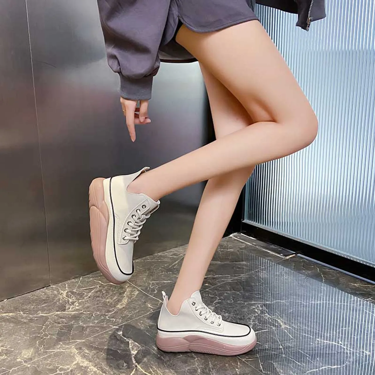 White stitch accents rocker bottom shoe sneaker