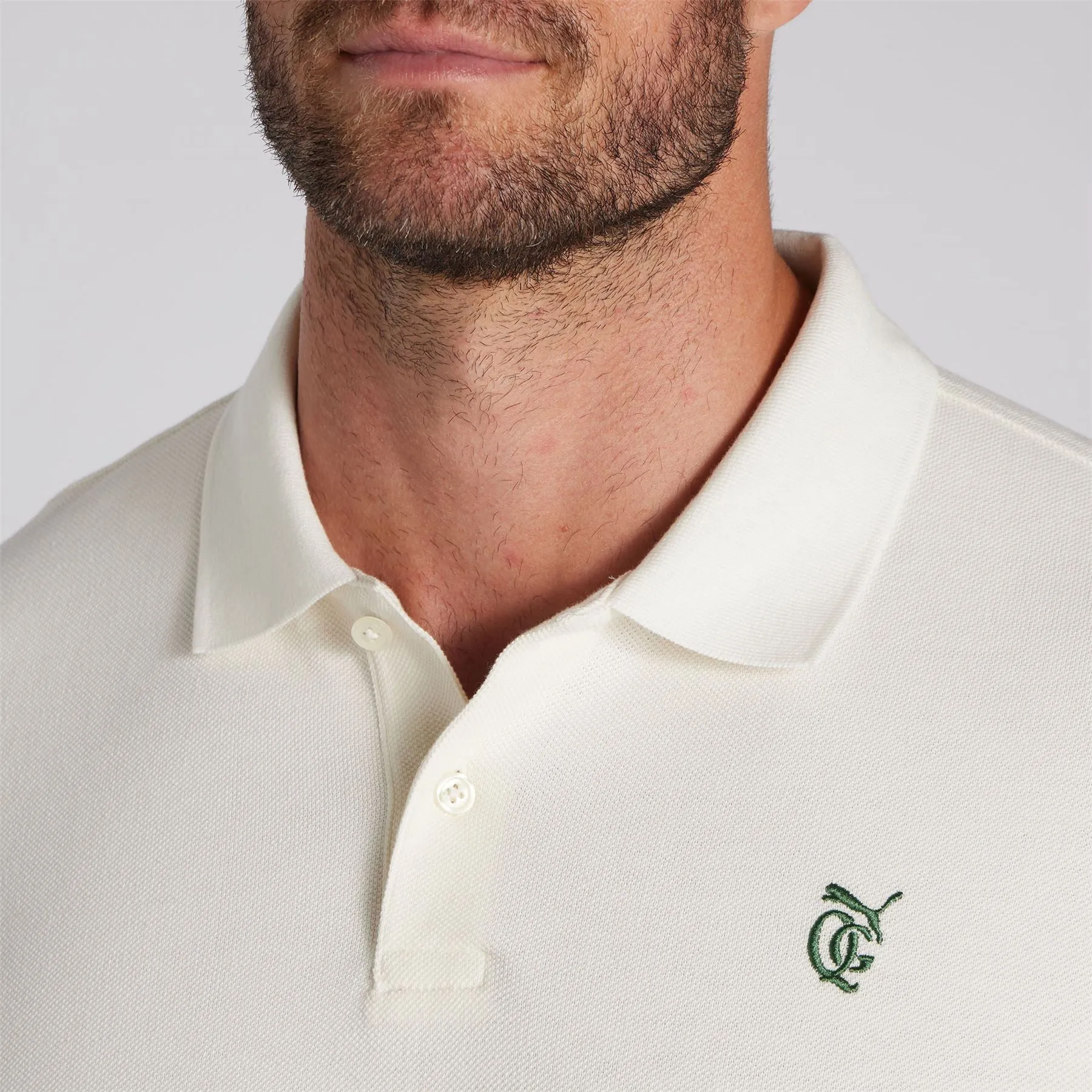 x QGC Post Round Polo Warm White - SS24